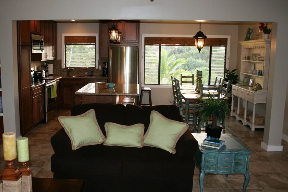 View of kitchen, dining room, and partial view of living room