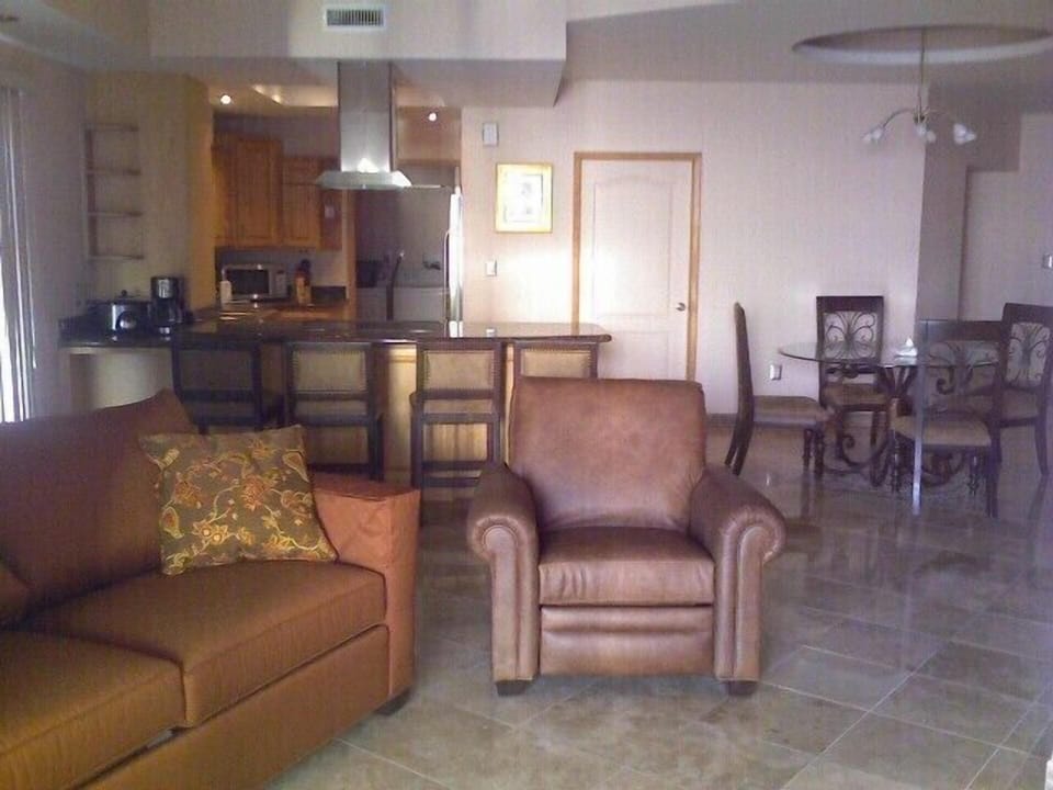 Family room with Couch and Captains chair