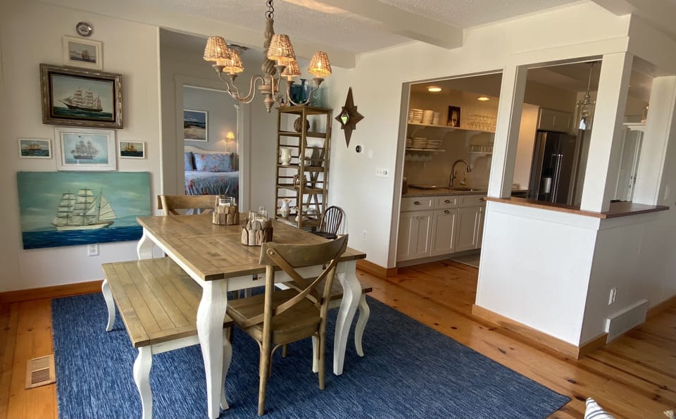 Dining, kitchen with view of master bedroom.
