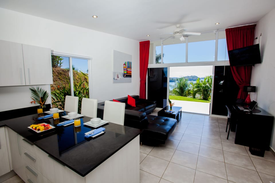 Your spacious vacation home with ocean views at the end of the garden
