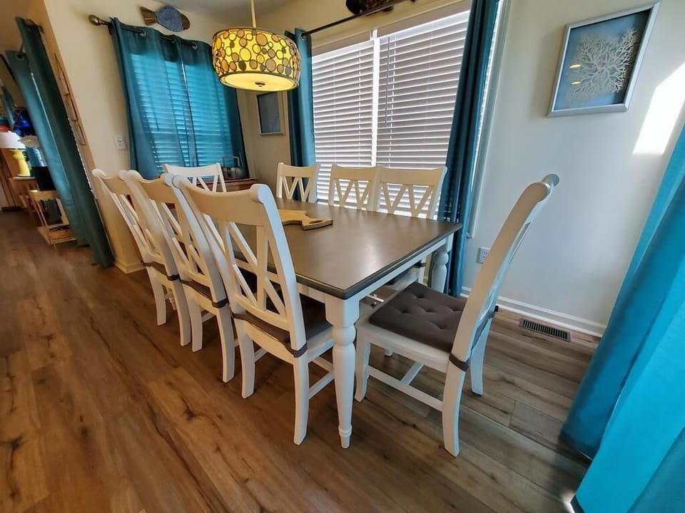 Dining table with 8 comfortable chairs