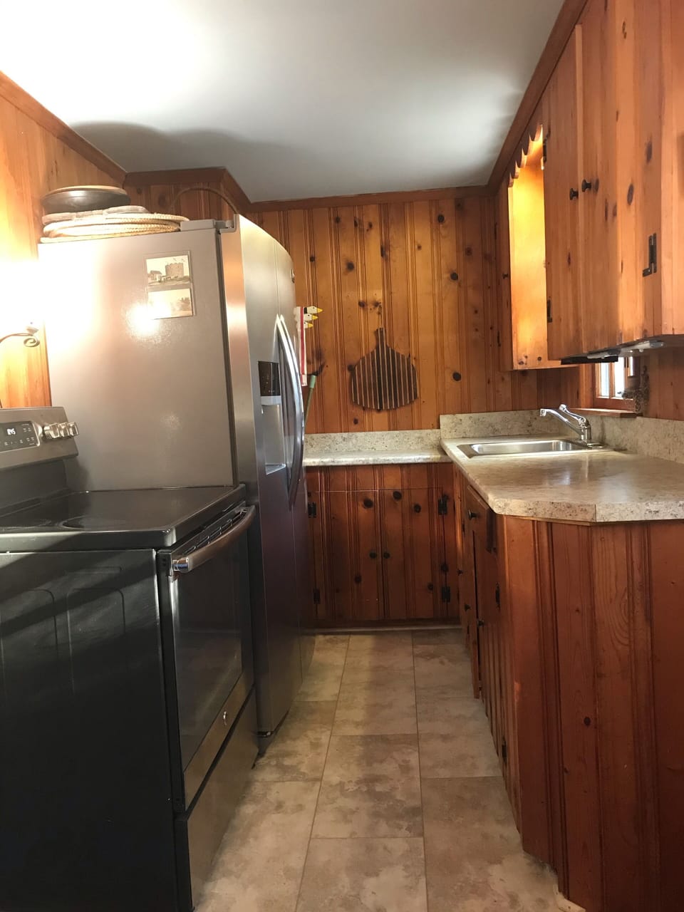 Kitchen electric stove, two door refrigerator with freezer,