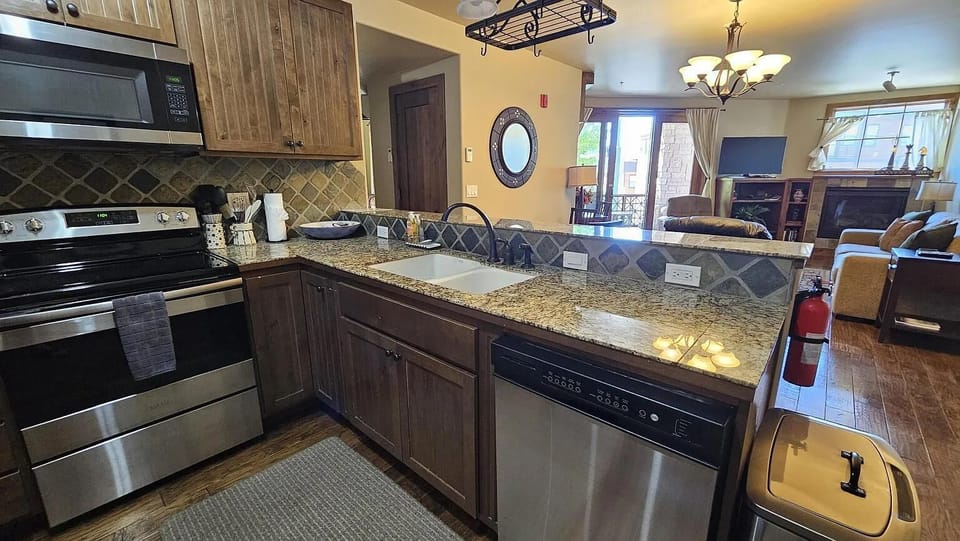 Kitchen w/ view of Living Room