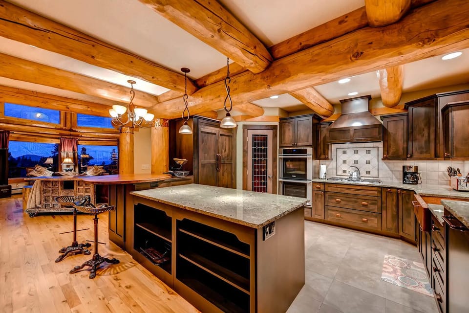 Modern chef kitchen open to the dining room and the large family room.