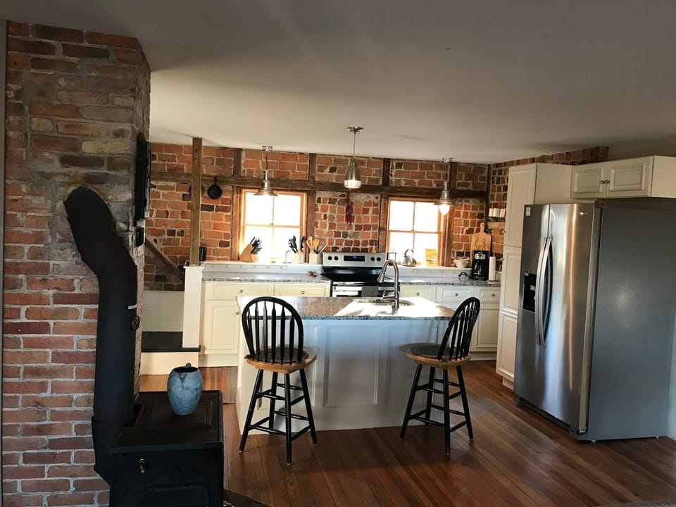 Kitchen opens to Family Room and is right next to the Dining Room.
