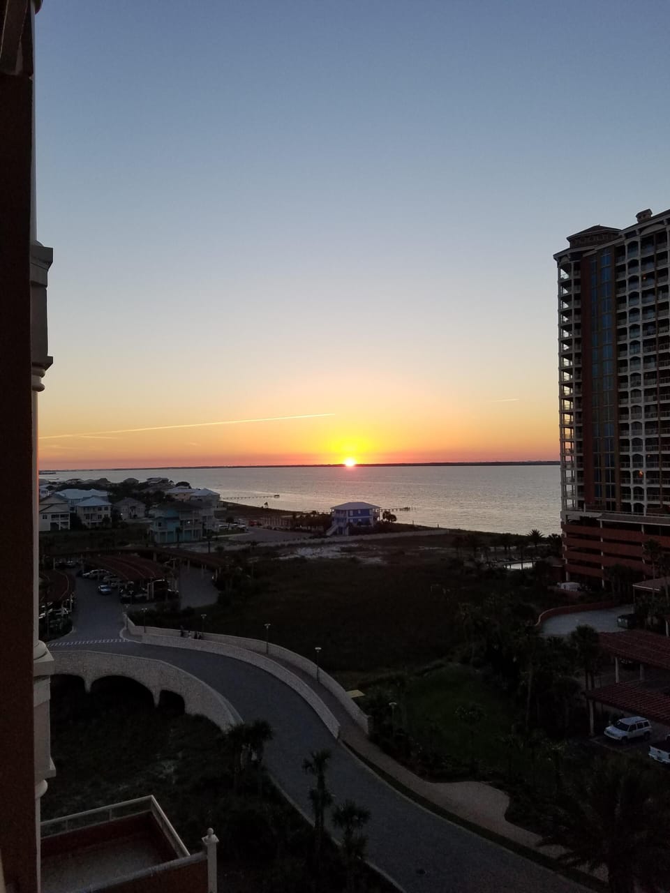 Side view from our balcony of sunset over the Santa Rosa Sound