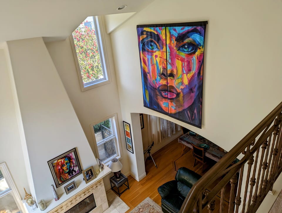 Mediterranean style house with gallery style artworks. 