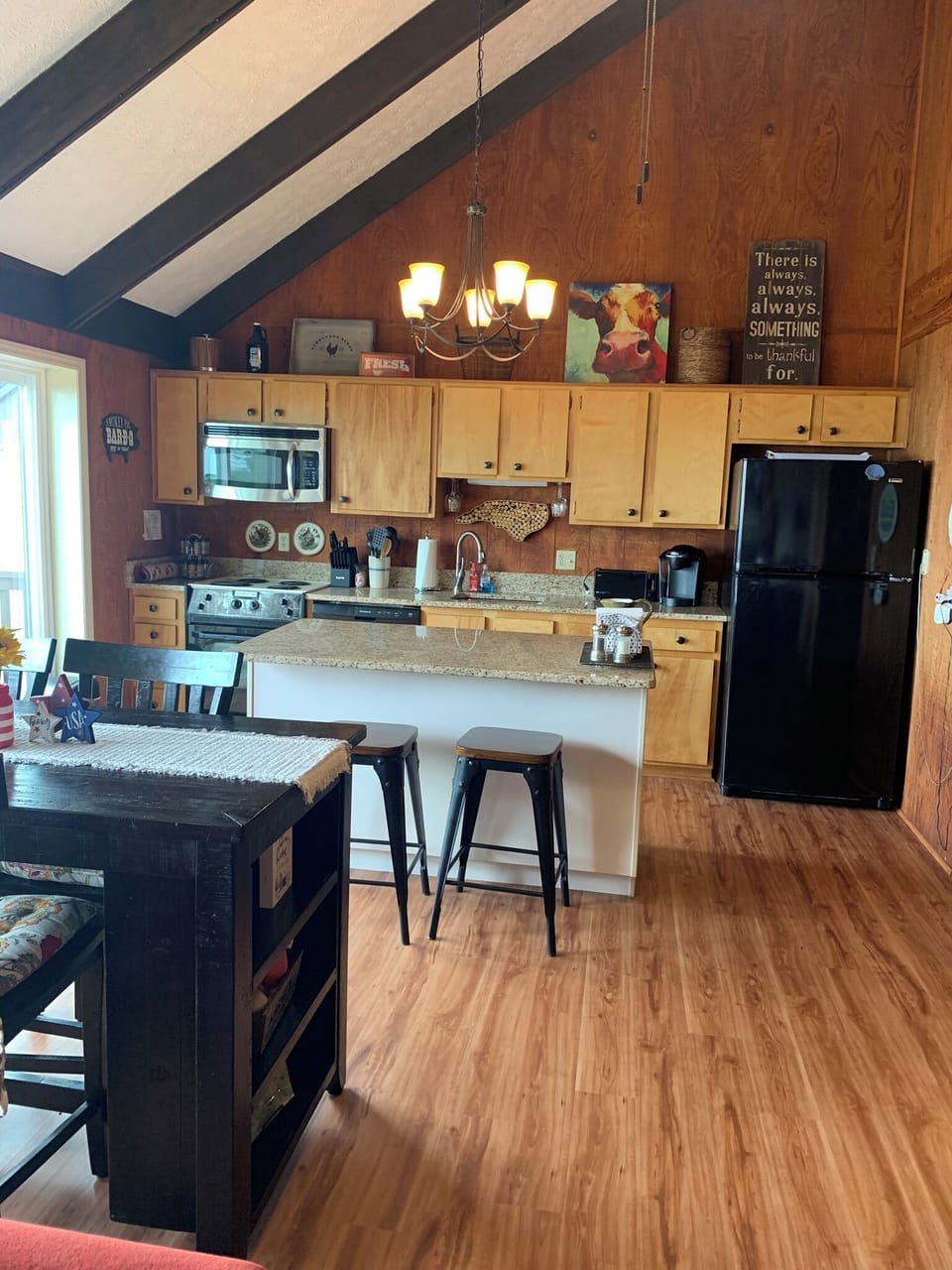 Open and fully stocked kitchen.