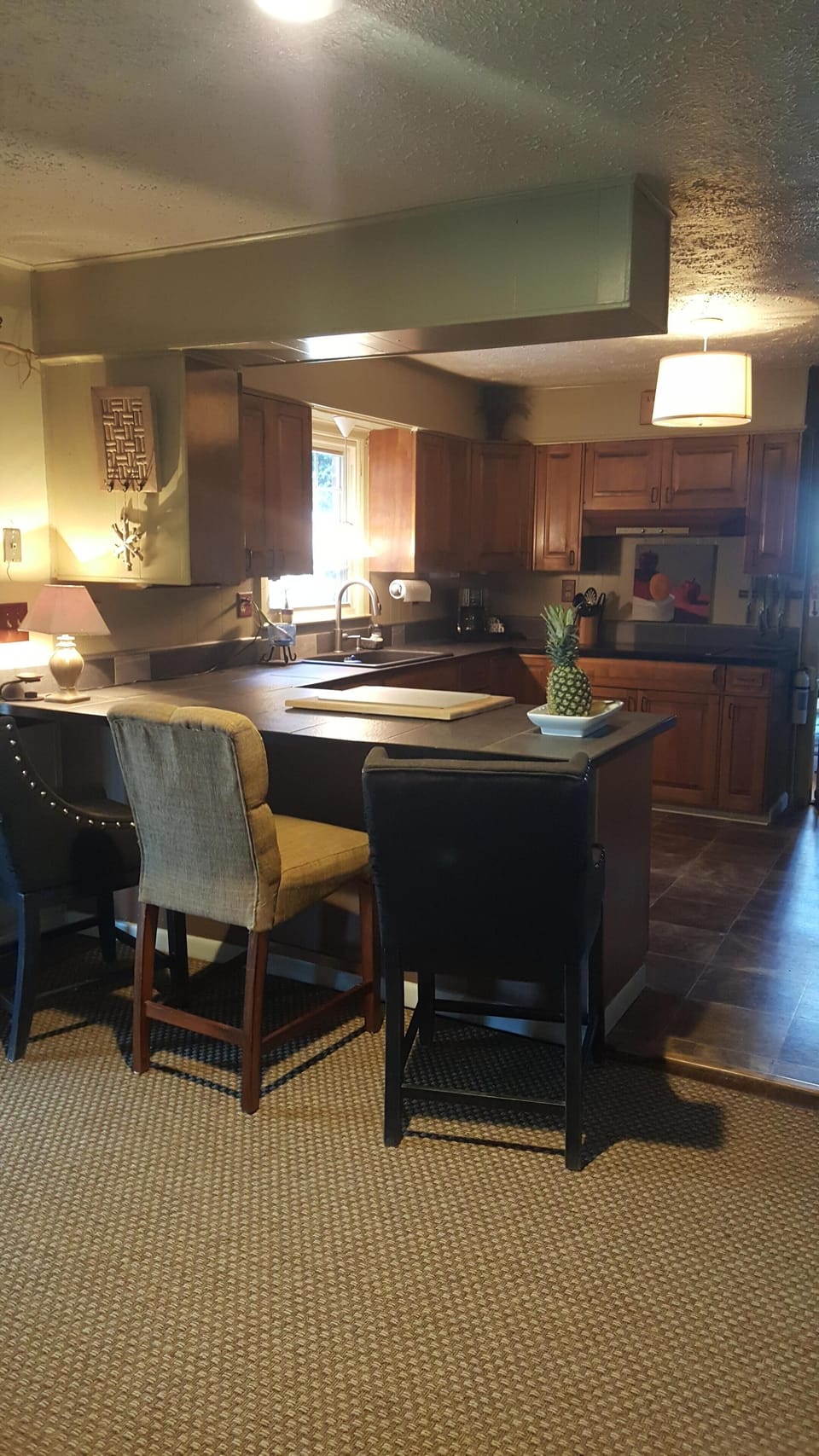 kitchen area adjoins living room