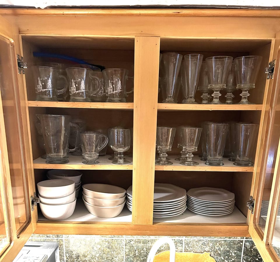Assortment of Glassware & Set of All Clad Pots & Pans in Fully Stocked Kitchen