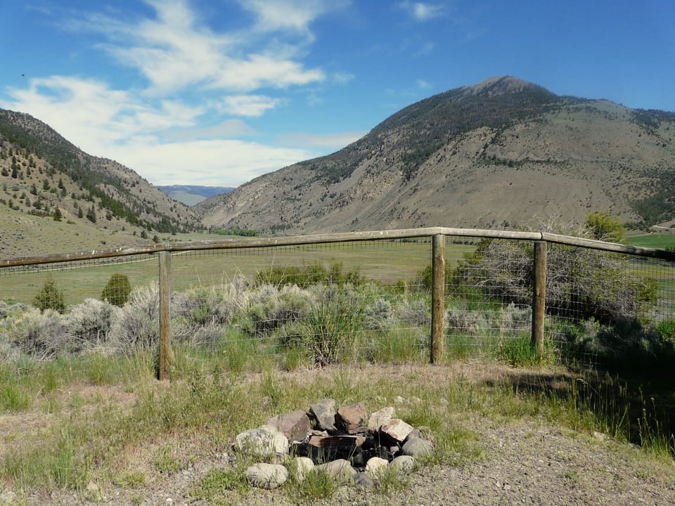 There is a fire pit in the yard. Firewood is provided.