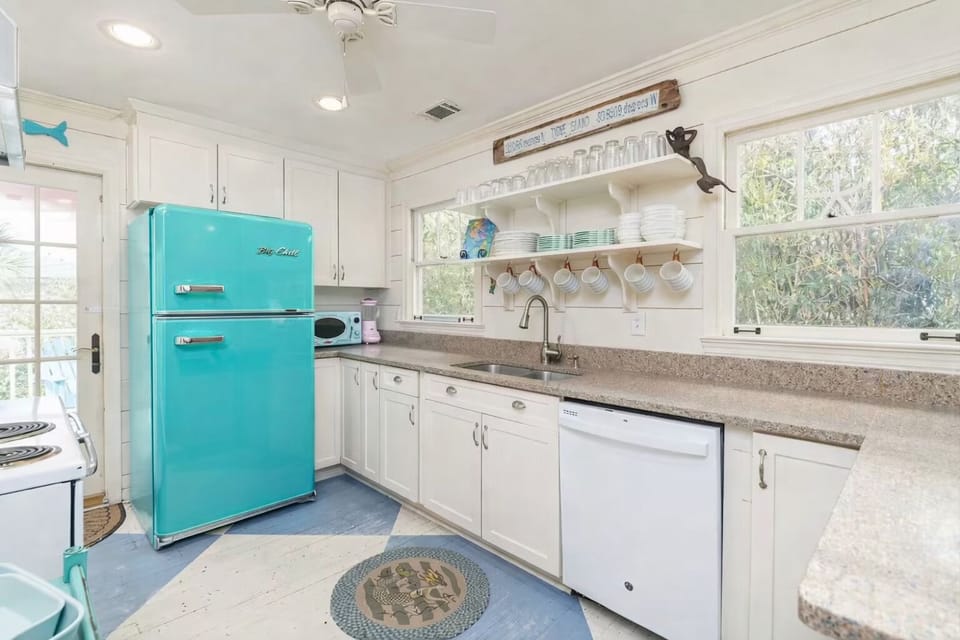 Big Chill fridge/freezer, dishwasher, oven, stove, microwave, and a disposal.