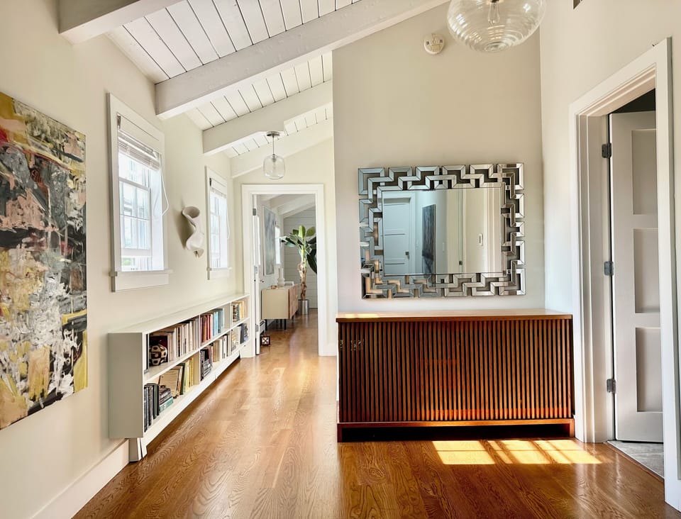 hallway leading to primary bedroom