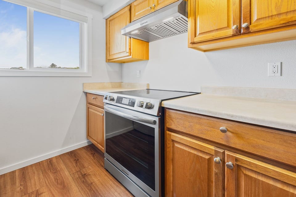 Clean and efficient kitchen available for family meals.