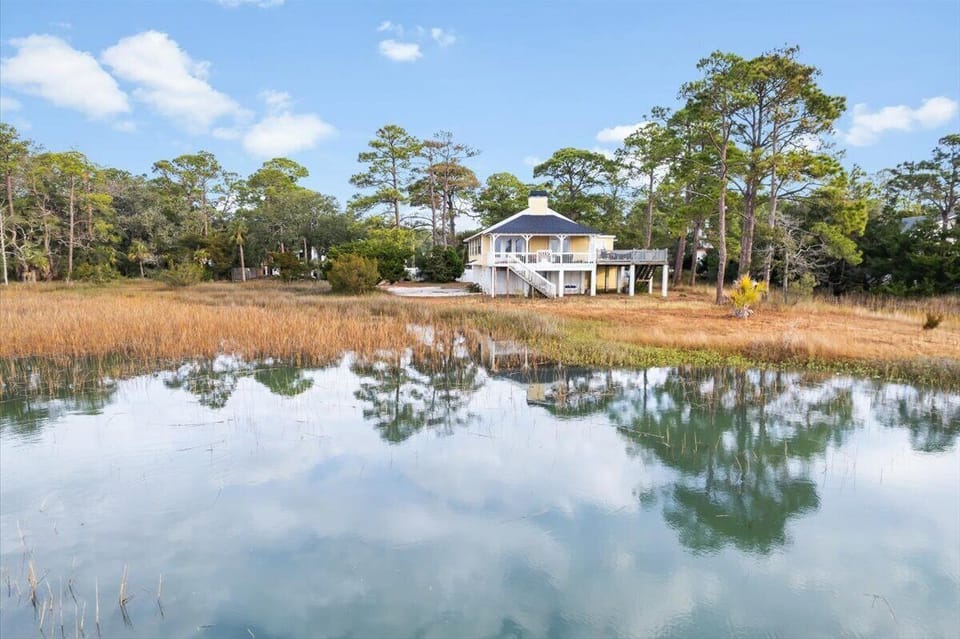 View of the house, and backyard at high tide.
