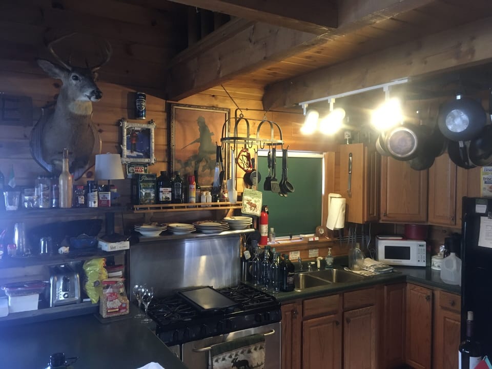 6 burner stove/oven with cast iron griddle. Microwave. 2 burner coffee maker