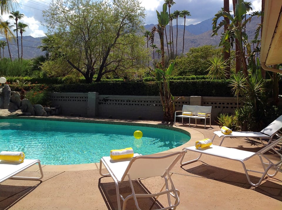 Spend the afternoon poolside, surrounded by beautiful landscaping