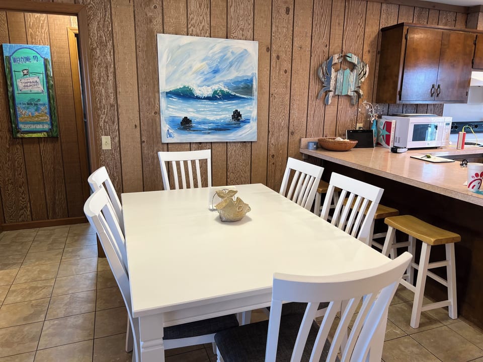 Dining table - there is a leaf with two extra chairs if you need more space.
