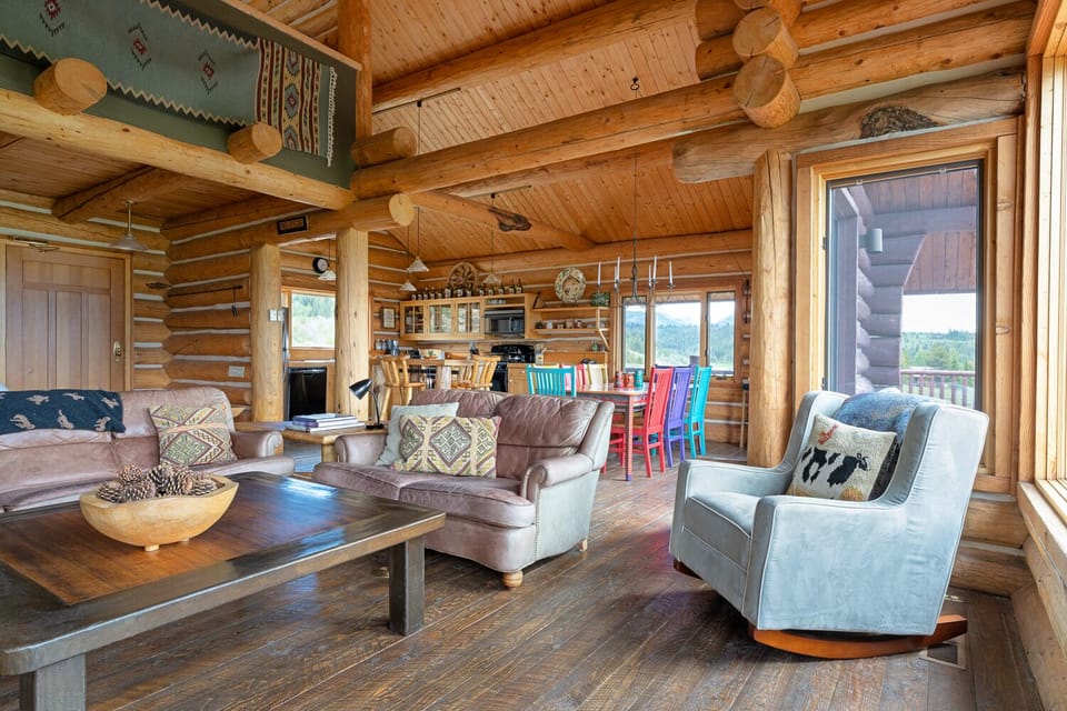 Open floor plan with living room, kitchen, and dining room all connected 