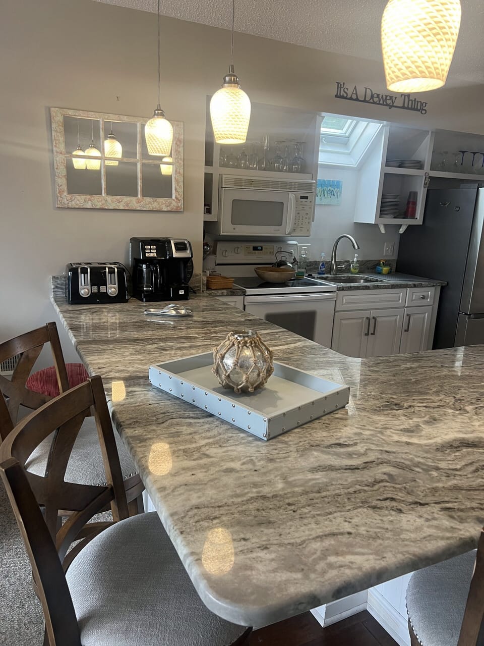 Counter seating for five around the kitchen