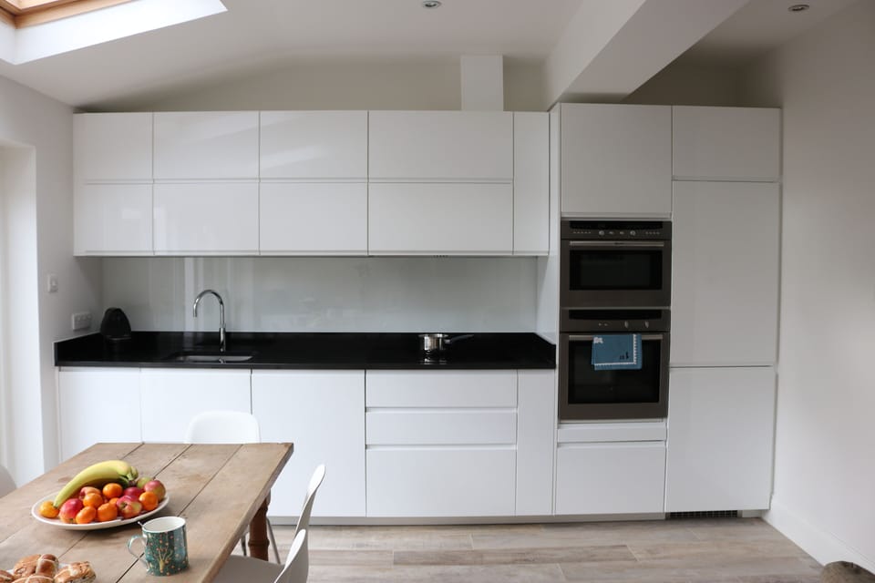 Kitchen with table moved to the window... trying a different layout!