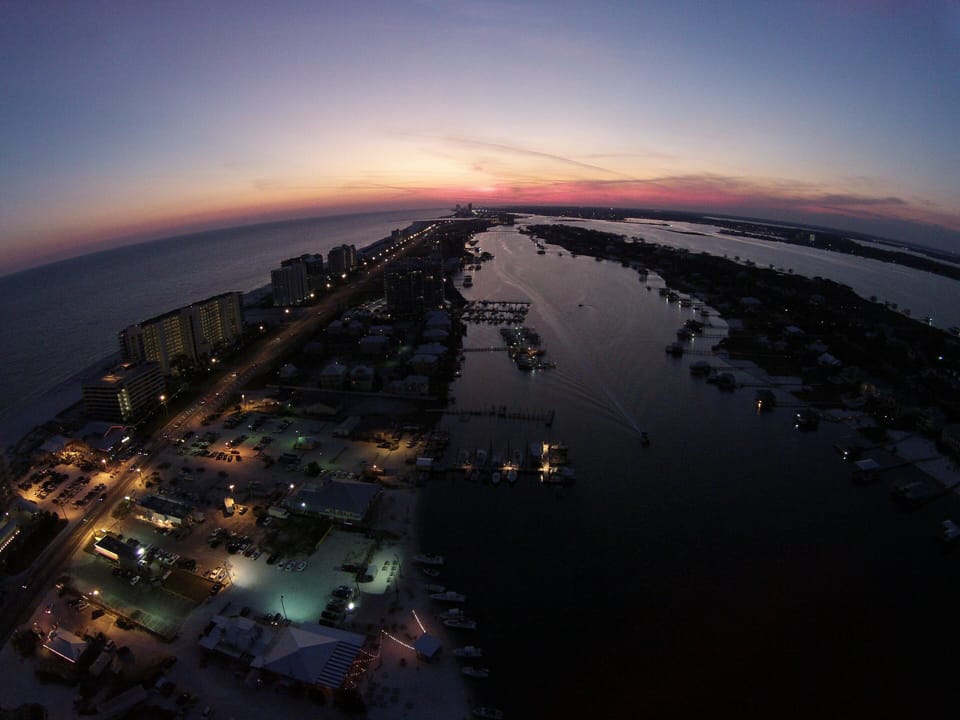 Drone shot above SummerSaltz looking west at sunset