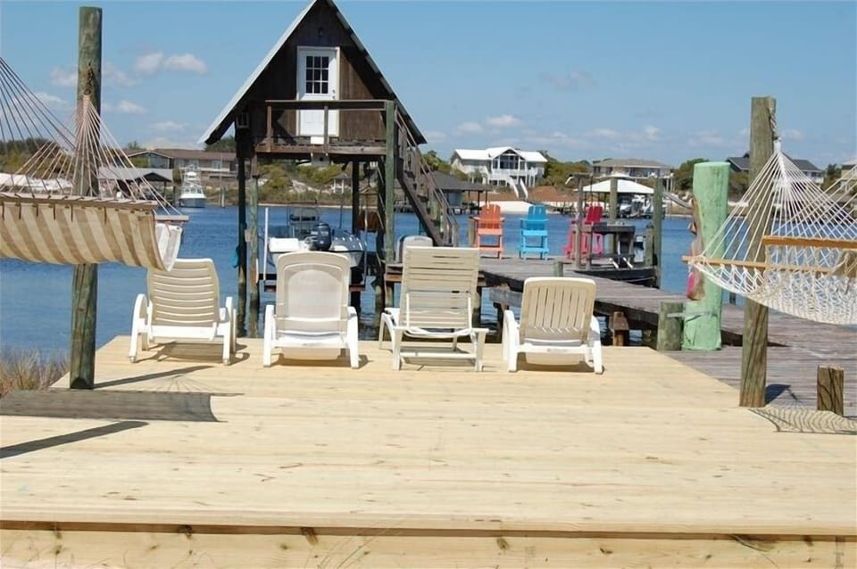 new deck with chairs and hammocks