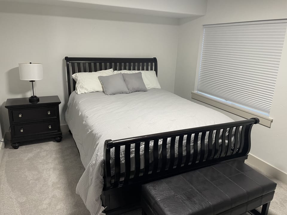 BEDROOM 5, QUEEN BED, LOCATED IN THE BASEMENT