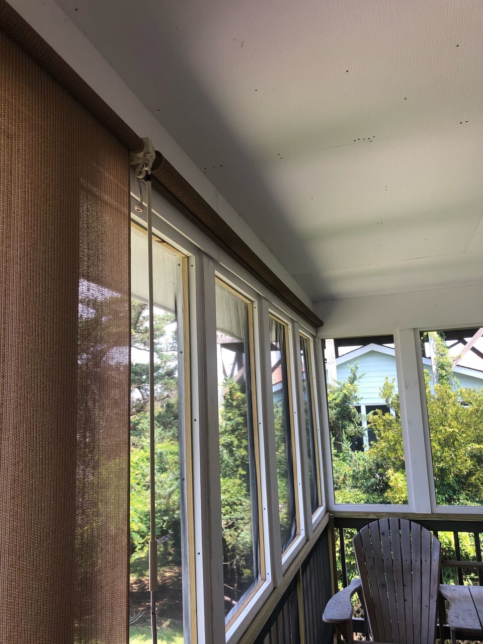 Roll down sun shades on the porch to keep it cool in the afternoon. 