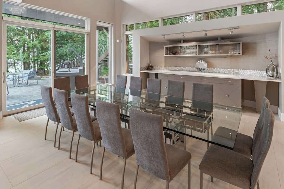 Dining for 14, plus additional seating at breakfast bar, sunken bar and outside.