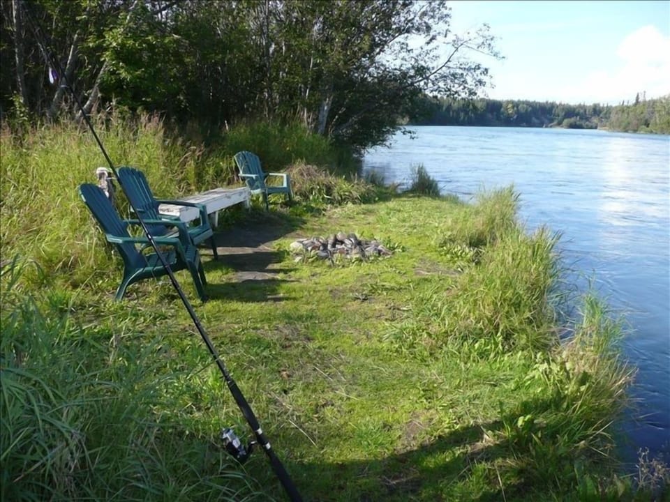 Relax or fish from our private riverbank