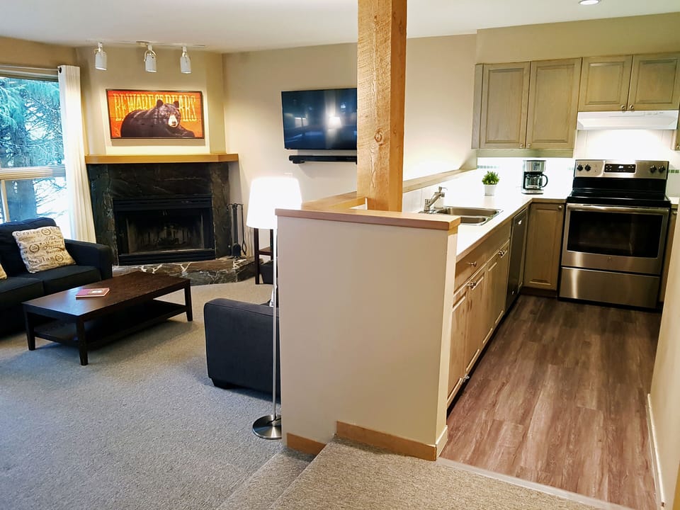 The kitchen overlooks the living room in this open floor plan.