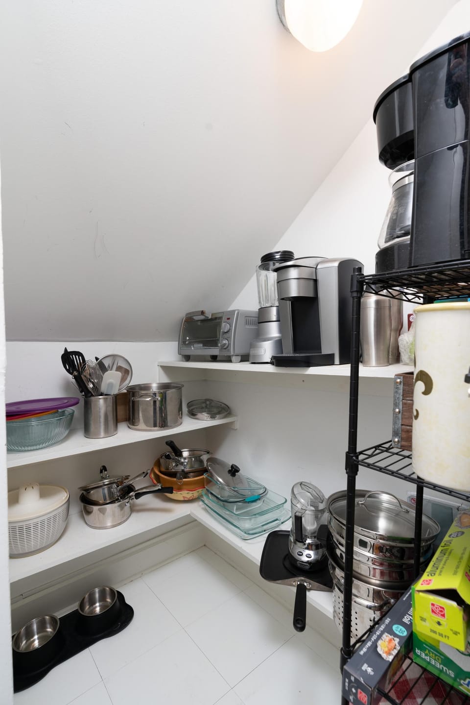 Kitchen pantry is stocked with most kitchen essentials.