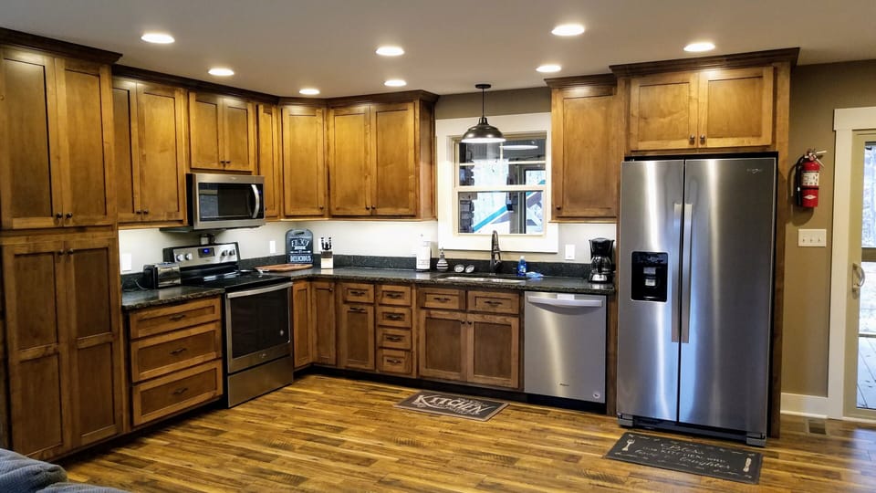 Fully equipped kitchen with stainless steel appliances
