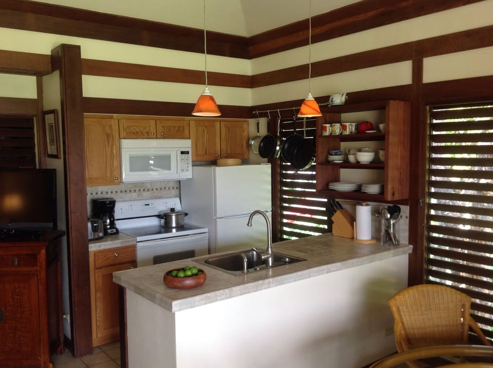The chef has an ocean view, too. Remodeled kitchen is open and airy.
