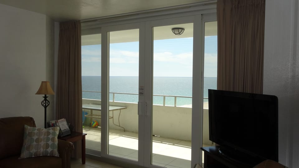 Living view room through the patio doors.  There are three sets of patio doors