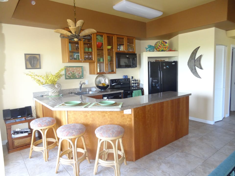 kitchen with colorful dishes, even prettier in person
 than pic. 