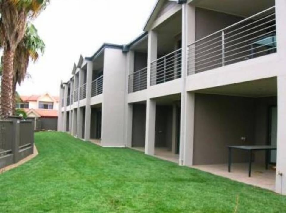 Communal lawn area in front of apartments