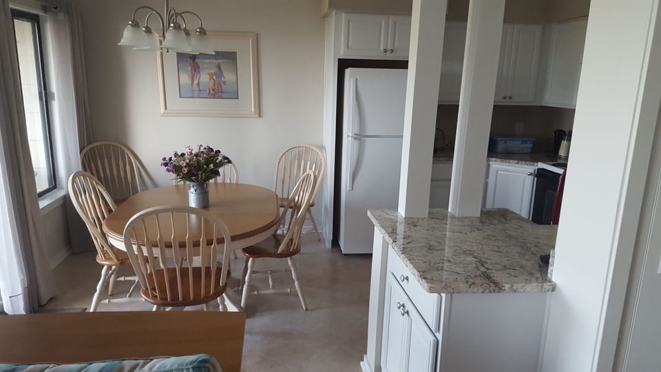 Open floor plan.  Can see ocean from kitchen as well as dining room table.