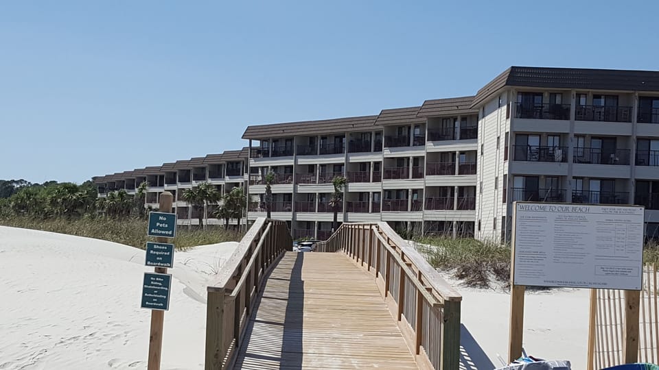 Boardwalk  over soft dunes for EASY beach access. Showers/footwashes 