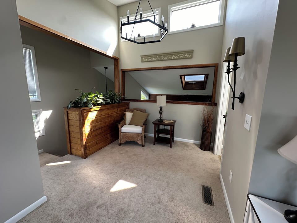 Master bedroom reading alcove overlooking great room