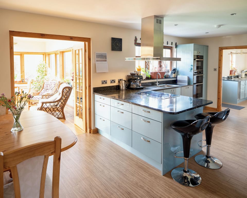 Kitchen and view through to Utility Room