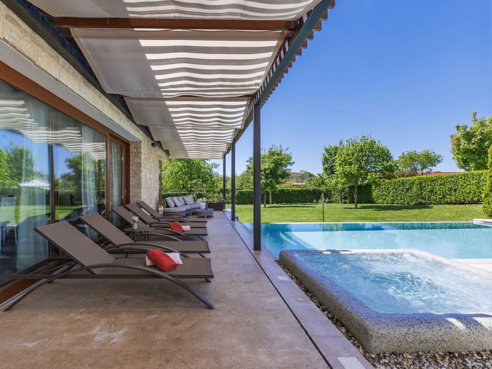 Property, Plant, Sky, Shade, Water, Outdoor Furniture, Grass, Leisure, Real Estate, Roof