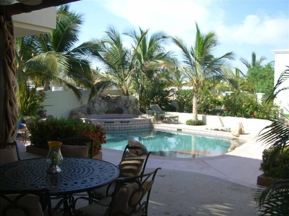 Covered lit outdoor dining area 