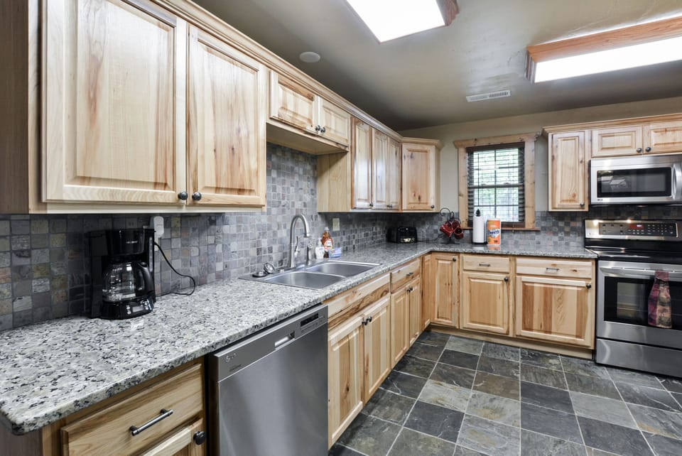 Stainless appliances and Hickory wood cabinets!
