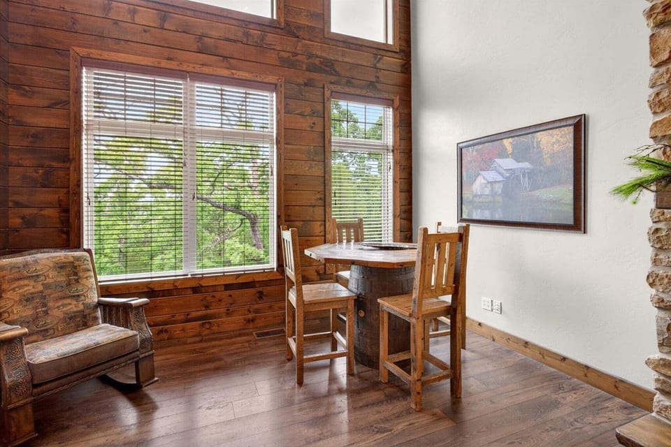 Additional dining seating for 4 at the bistro table in the main level living room