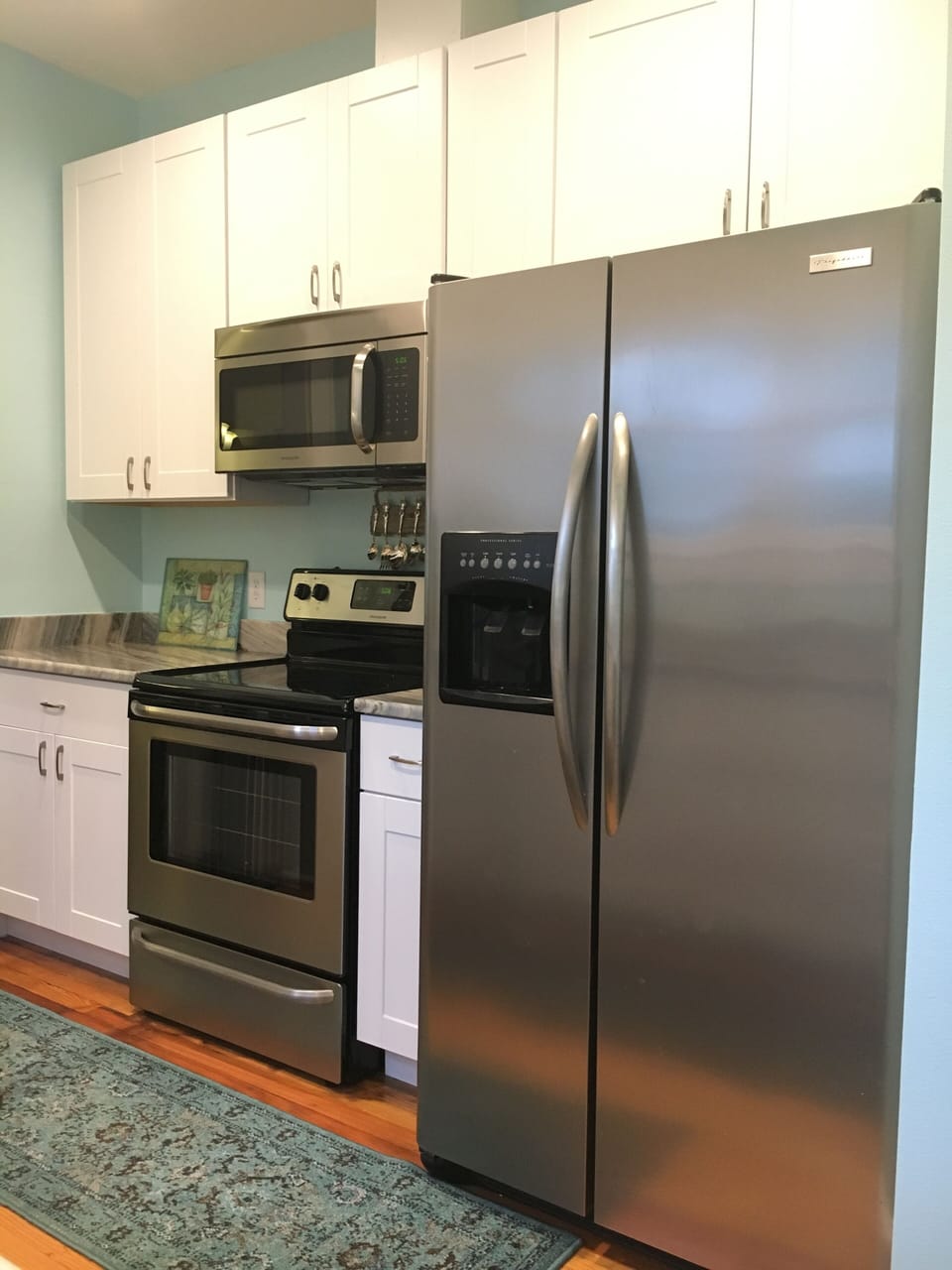 Side by side refrigerator has ice maker