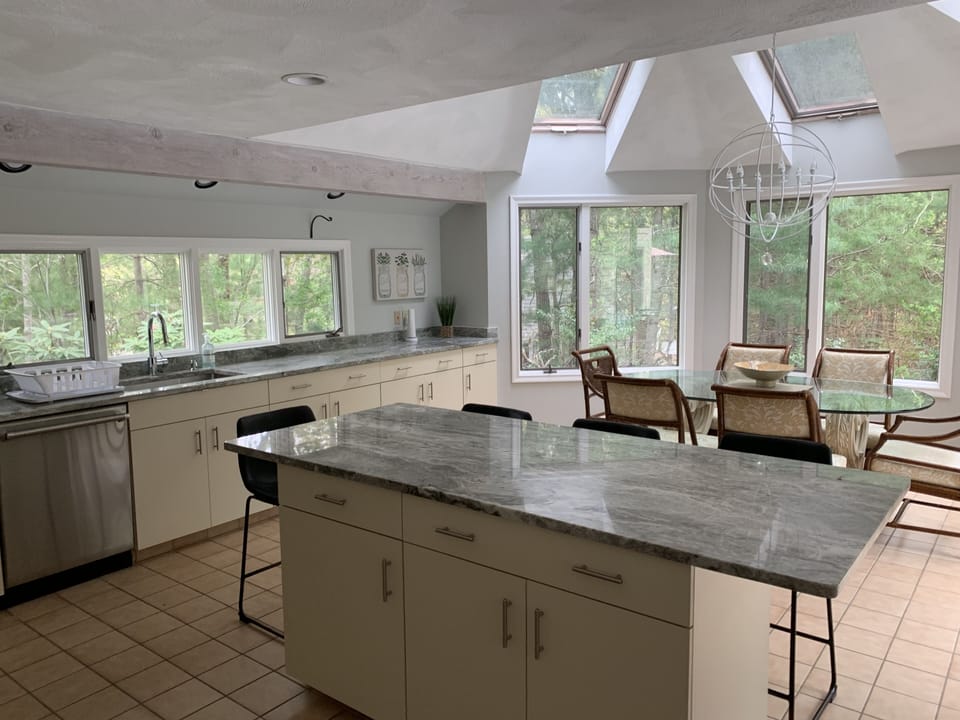 Kitchen with granite counters and stainless appliances 