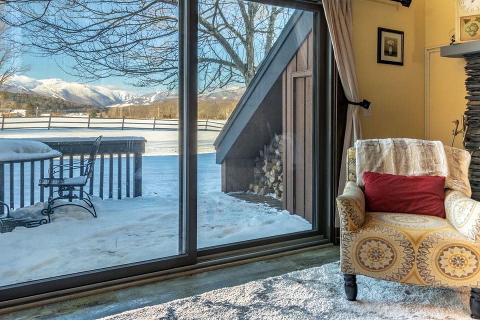 Fully stocked wood bin close by for quick access to keep the fireplace going.