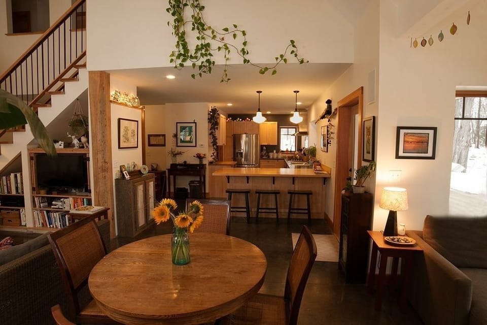 Great kitchen with double ovens, a dish pantry and a seated counter.